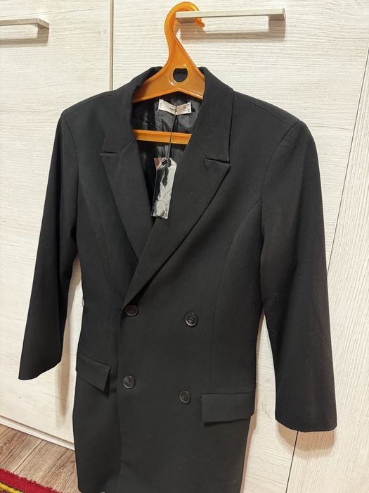 Продам новый костюм