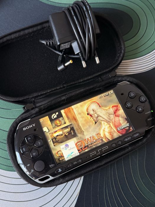 PSP 3001 modat Ark4  50 jocuri 64gb