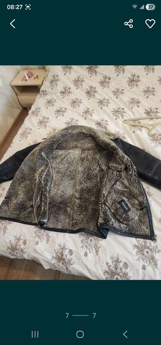 Продам куртку теплую