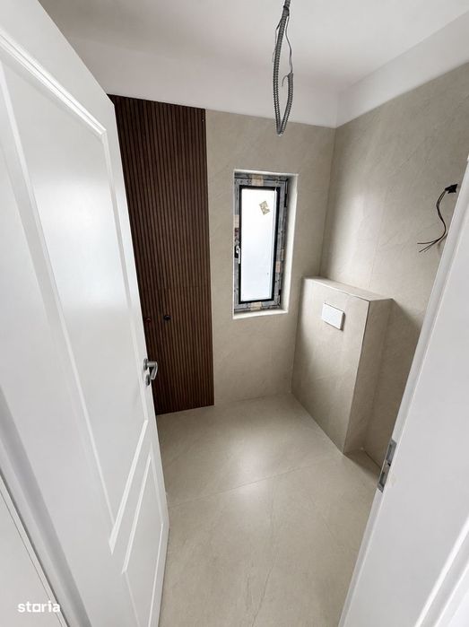 Casa cu 4 camere, curte de 400 mp, nouă în Clinceni