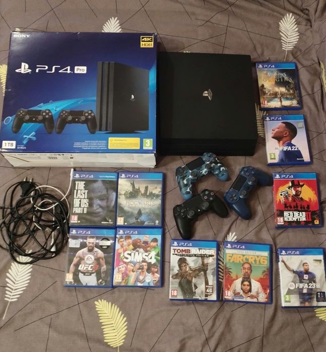 Play Station 4 Pro(ultima versiune) 1Tb+ 3 controllere+ 10 jocuri+accesorii+cutie