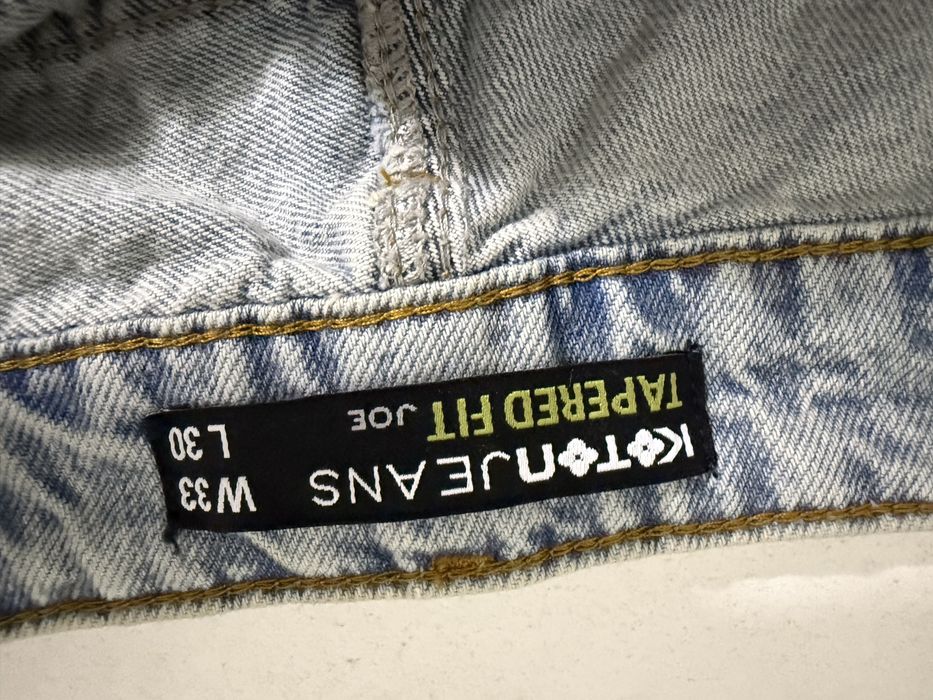 джинсы Tapered fit