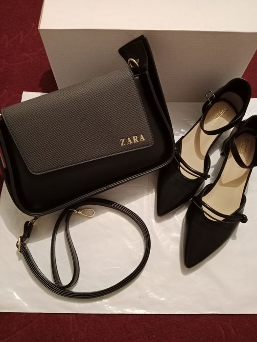 Женские туфли и сумка.