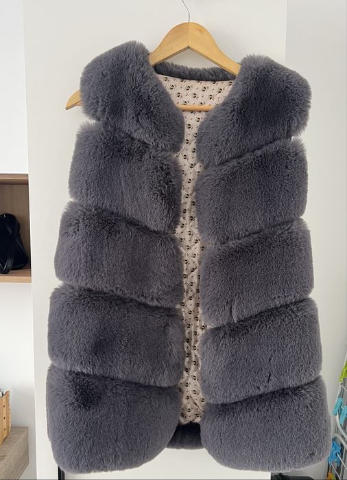Vesta cu blana copii
