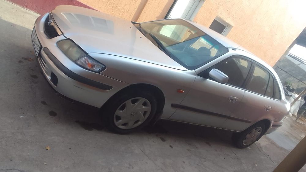 Мазда 626 птичка