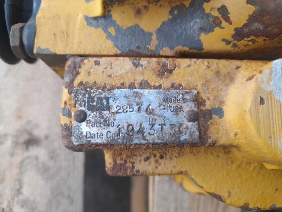 Distribuitor hidraulic Caterpillar 1943T30 buldoexcavator Caterpillar 428
