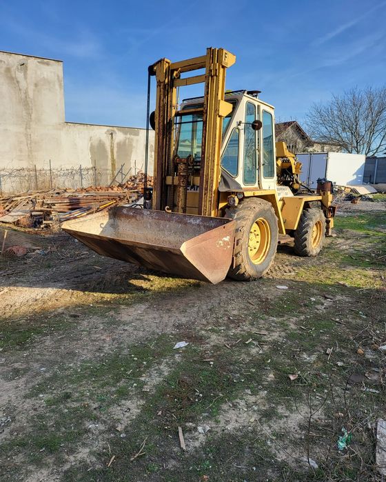 Buldoexcavator si manitou Buffalo Ferro