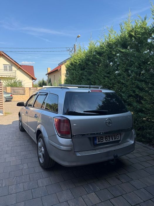 Vand masina opel astra