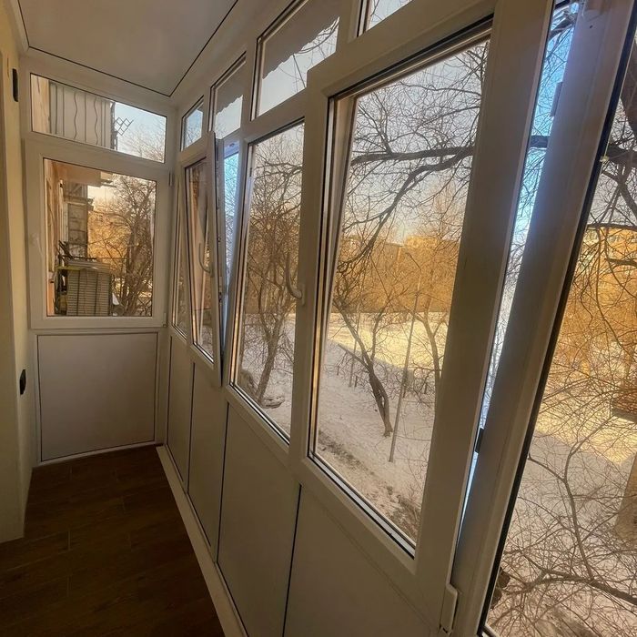 Пластиковые окна двери балконы