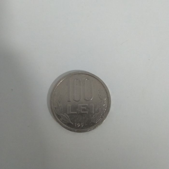 Vand moneda 100 lei