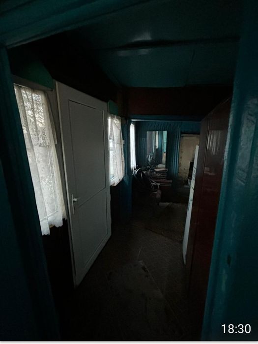 Два дома на одной ограде