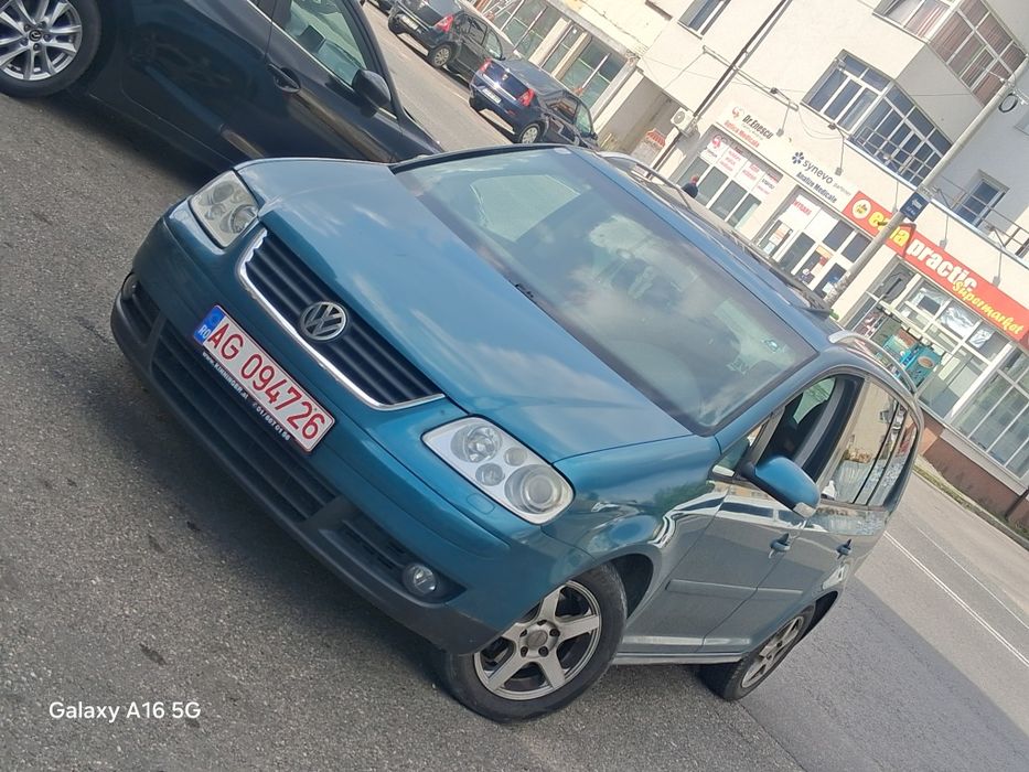 Touran an  2004 ..motor20.  140  cai  dsg bks