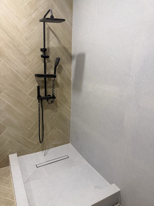 Опытный кафельщик