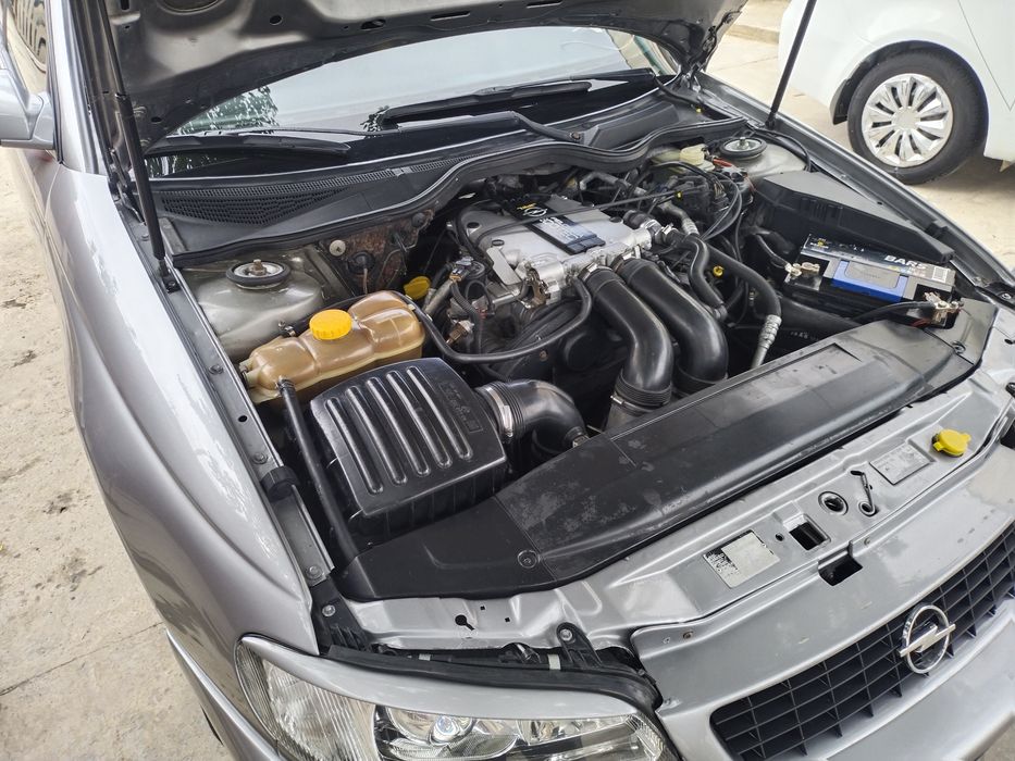 Опель омега б объем 2.5