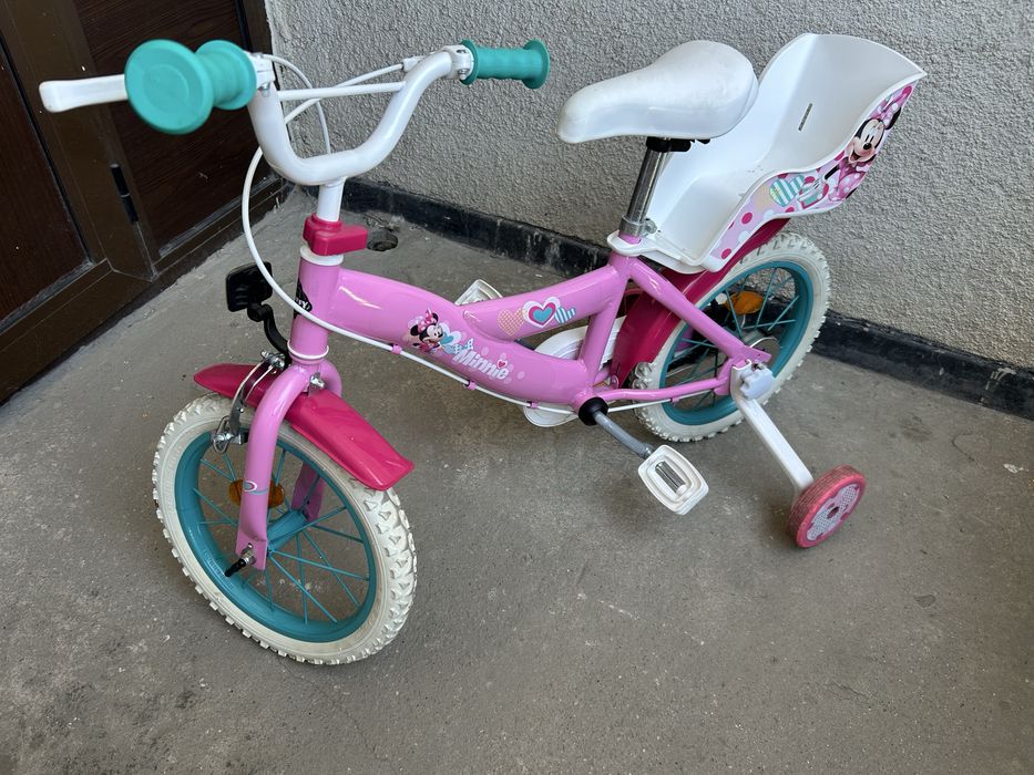 Bicicletă fetițe Huffy Disney Minnie Mouse cu roți ajutătoare și scaun păpușă