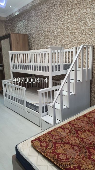 Двухьярусная кроватиь