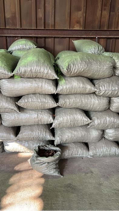 Мелкий песок в мешках