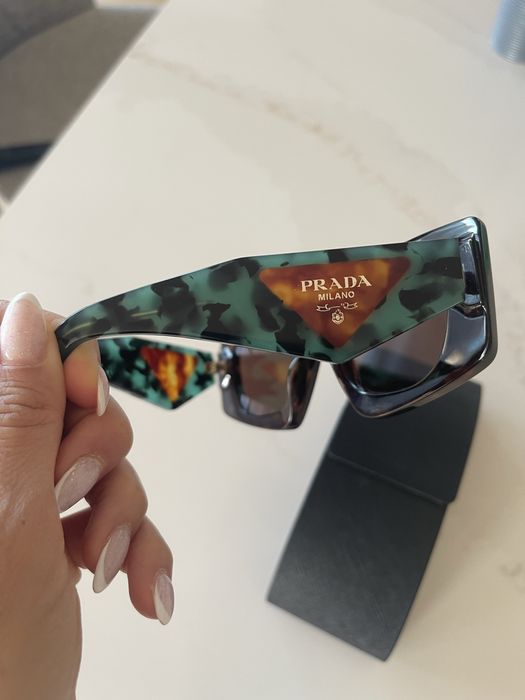 PRADA Temple tortoiseshell-effect sunglasses