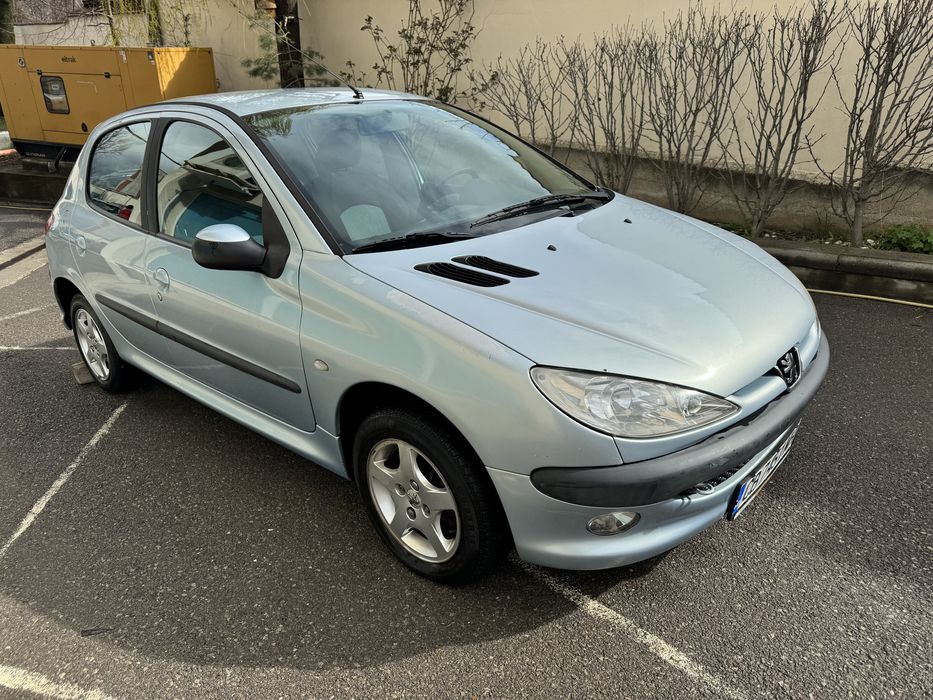 Peugeot 206 1.4 75 коня бензин