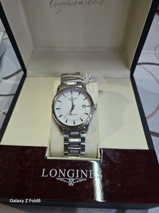 Longines quartz нов
