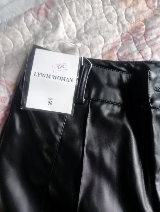 Новый брюки из экокожы.