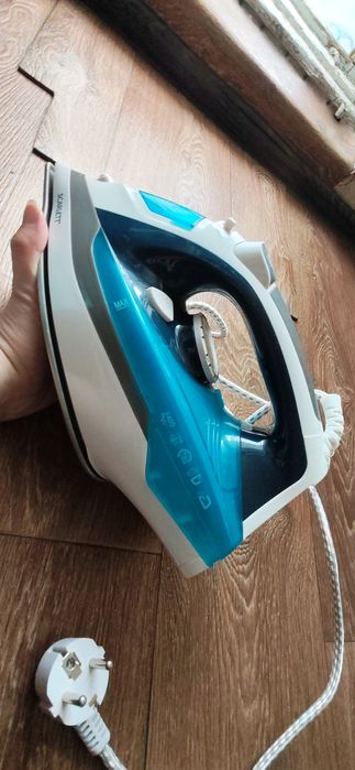 Продам абсолютно новый утюг