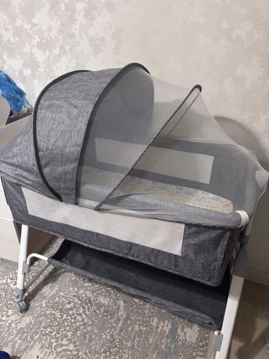 Продам манеж кровать новый