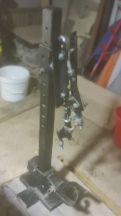 Стяжка амортизатора