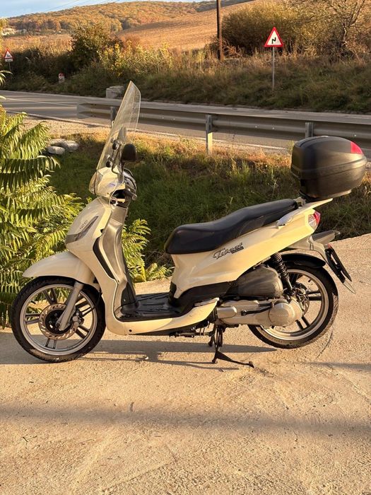 Scuter Peugeot Tweet 125 cc se conduce cu B  recent adus !