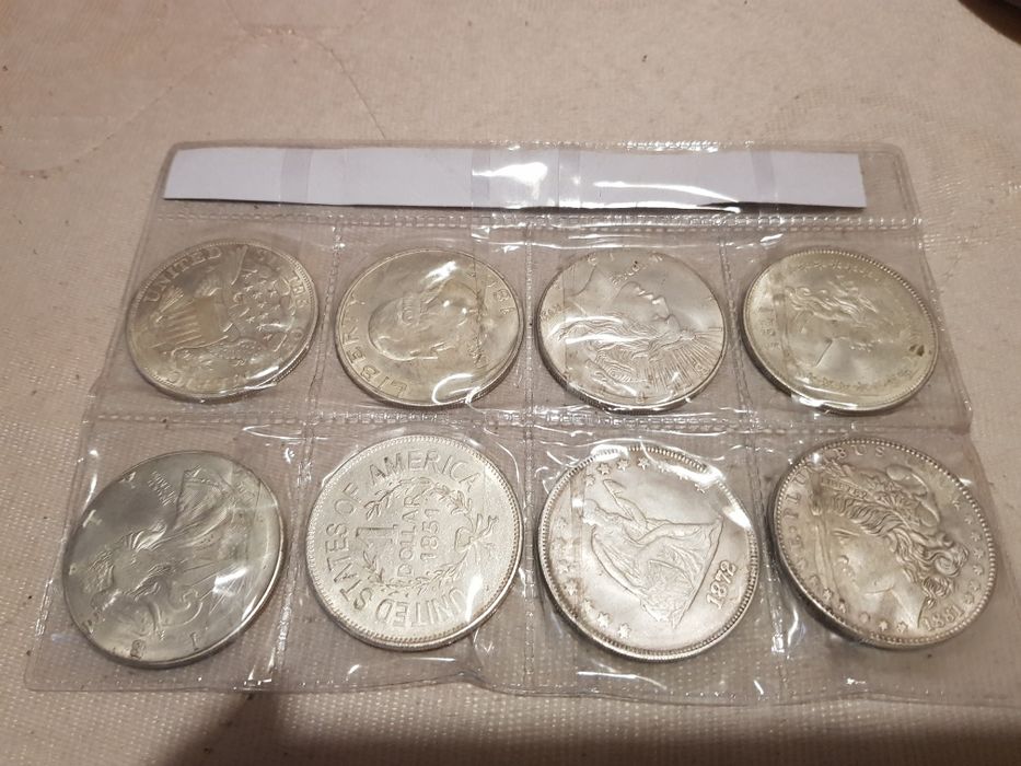 Монети от One  Dollar