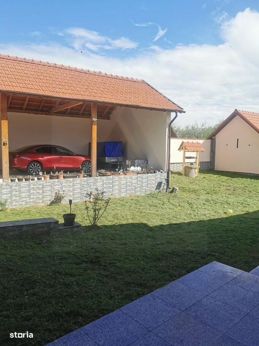Casa individuala cu garaj 60 mp si teren+gradina 2650 mp in Porumbacu