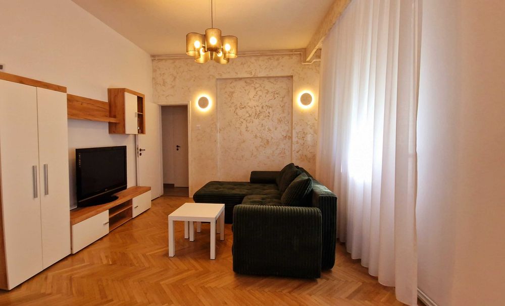 Inchiriez ultracentral apartament 2 camere si dining la parter de casa cu curte - loc de parcare inclus-  Bucuresti  zona Piata Muncii