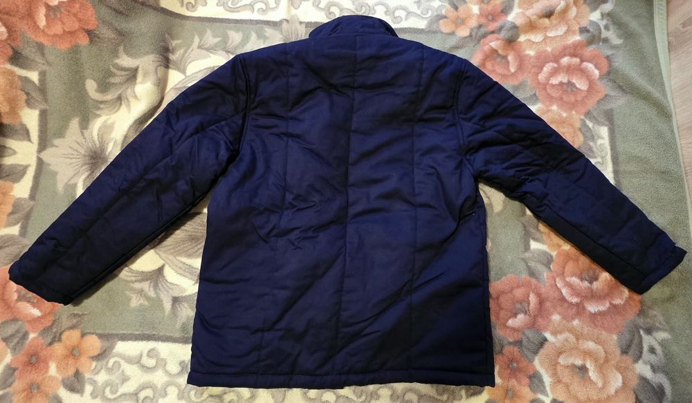 Pufoaica vatuita bleumarin inchis (marimea 52)