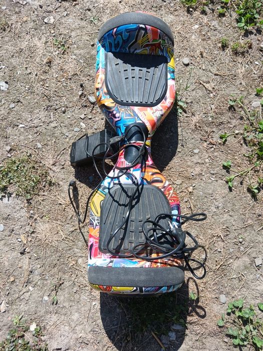 Vând skateboard electric in stare buna de funcționare cu încărcător ,husa .