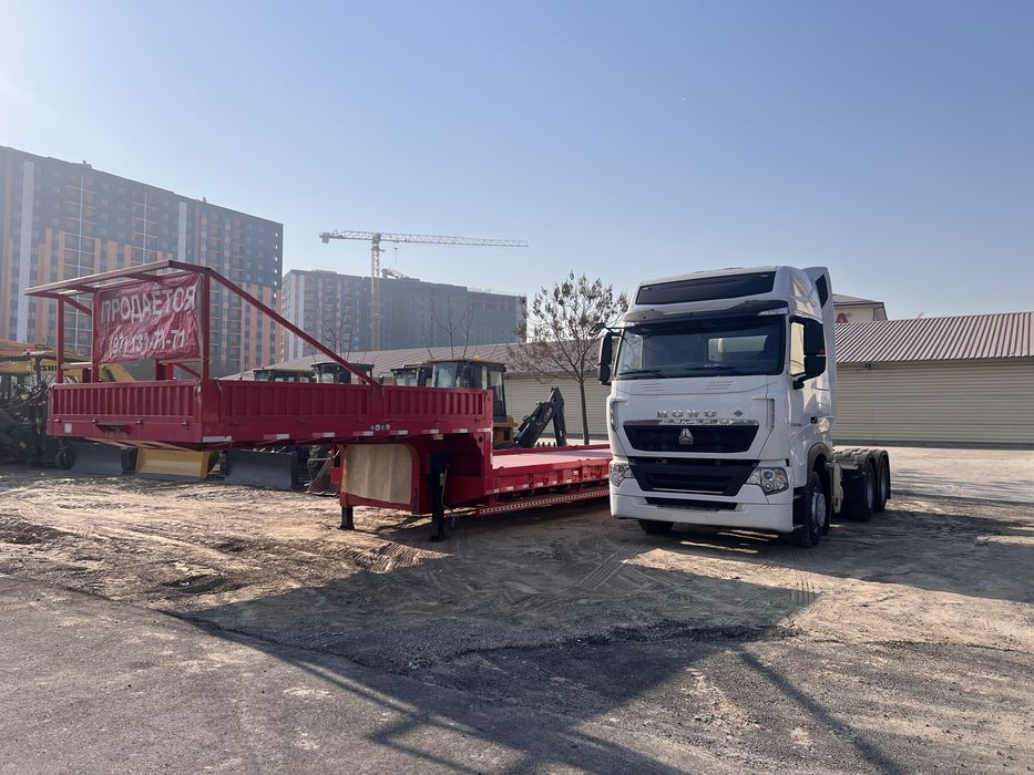 Тягач. HOWO. T7H ва Трал 17.5 м. Янги.