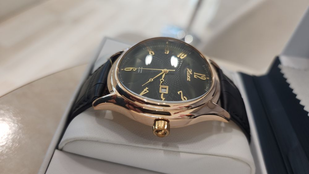 Золотые часы Ника