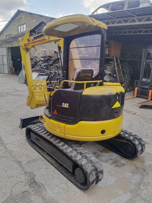 Миниэкскаватор Caterpillar