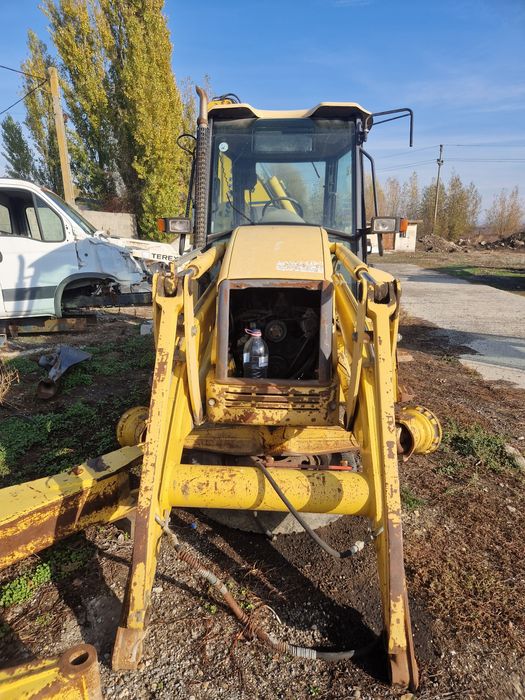 Piese buldoexcavator Komatsu WB93R-2