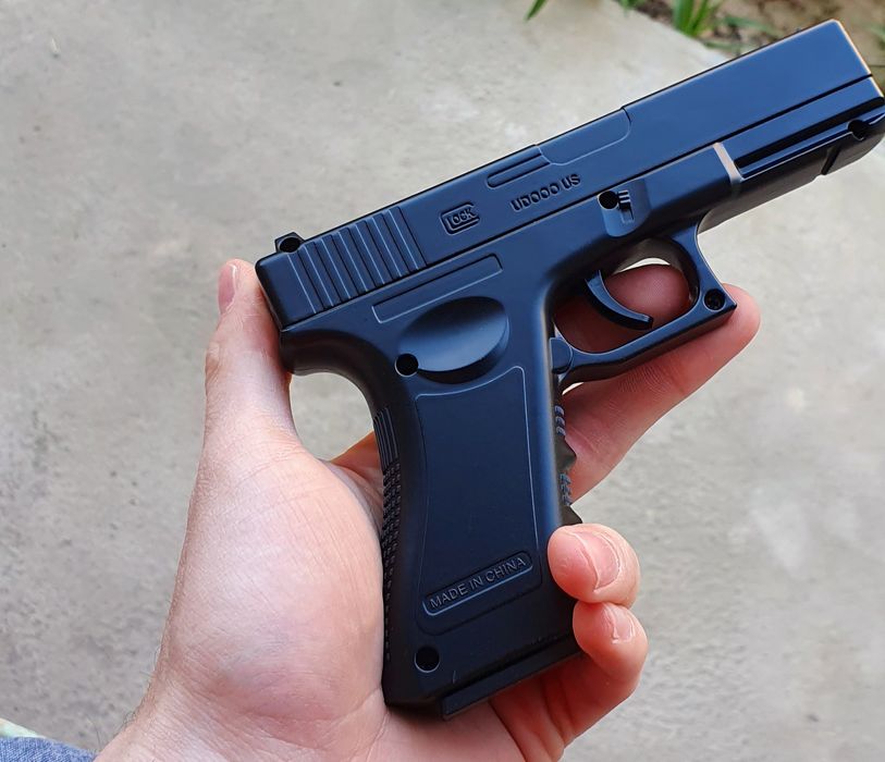 Игрушка железный пистолет