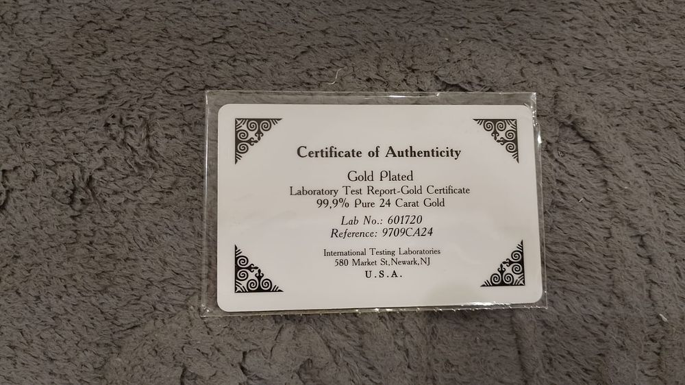 Золотые 10000 тг