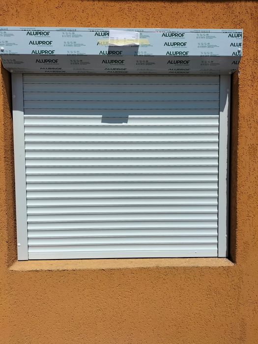 RULOURI Aluminiu si Usi de garaj rezidentiale SECTIONALE