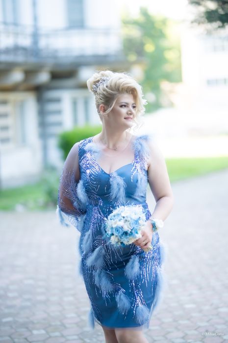 Rochie cu pene naturale.