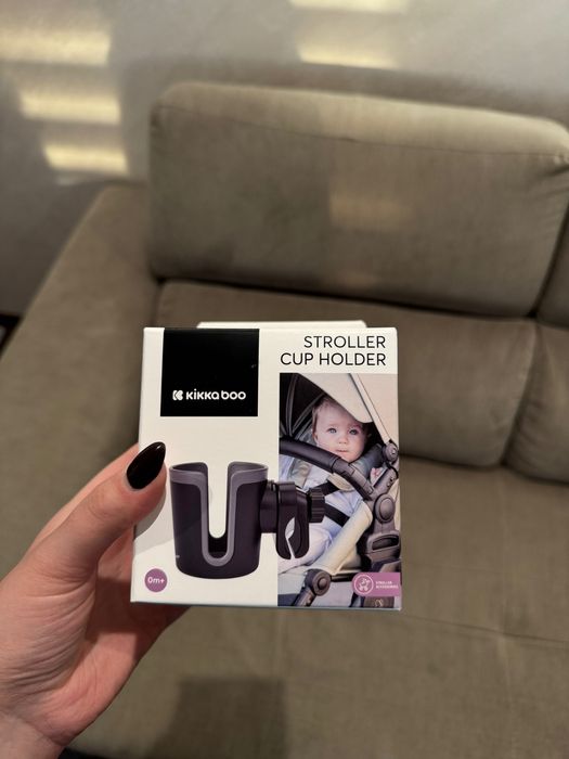 чашка за кафе и чадър за бебешка количка