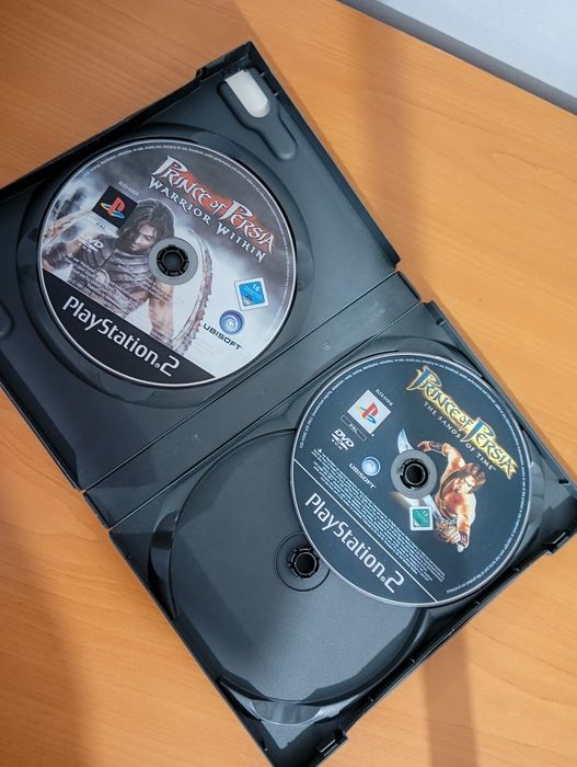 PlayStation 2 Slim + 8 jocuri + manetă