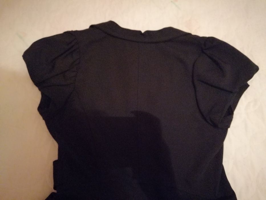 Елегантен елек с пеплум