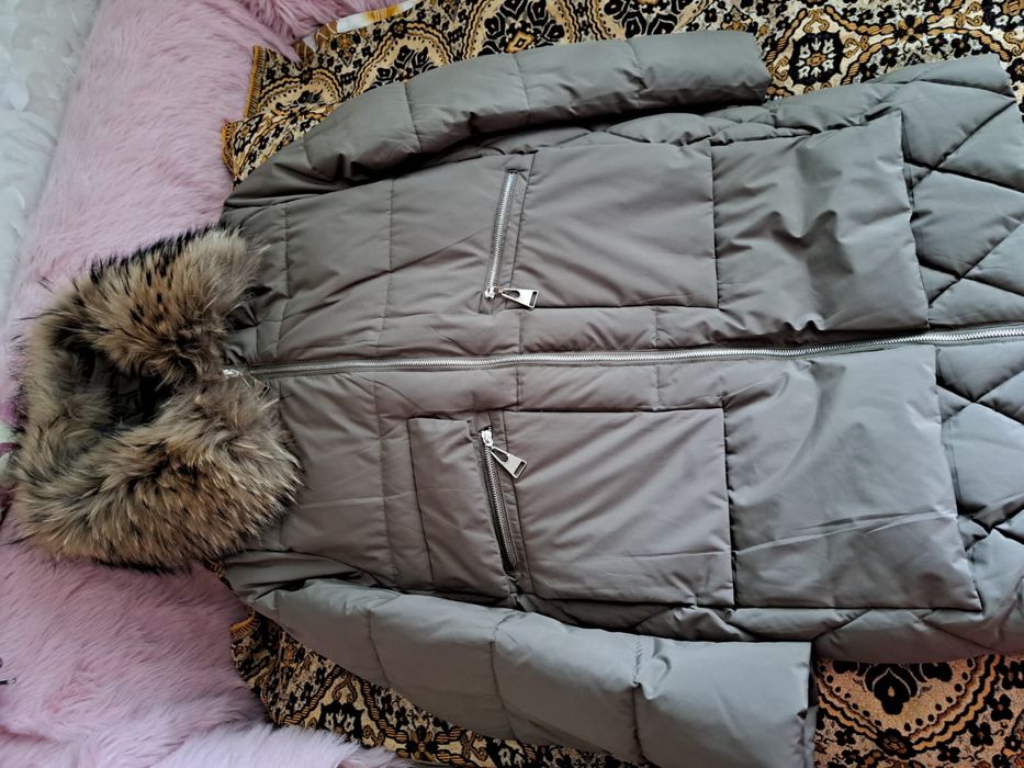 Продам пуховик женский новый