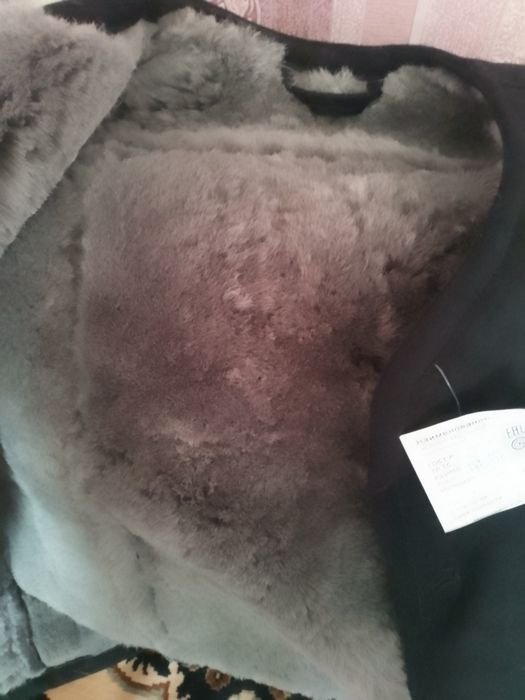 Продам жилет меховой.