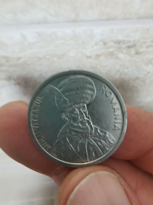 Vand monedă 100 lei