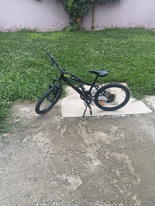 Bicicletă pentru copii 7/10 ani