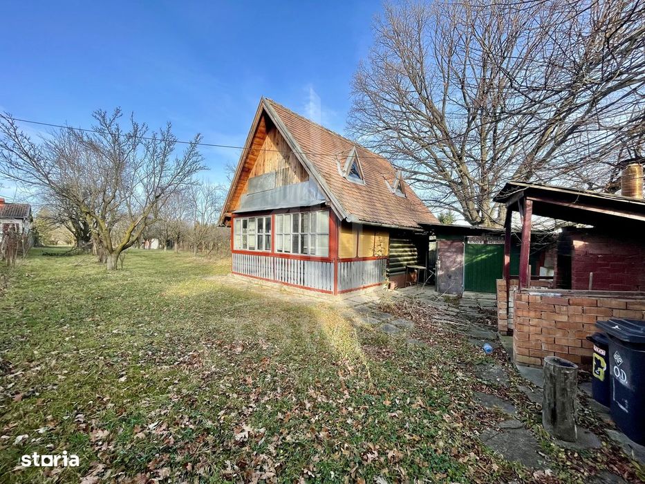 Teren intravilan 1.915 mp + cabană din lemn | Tocile – Sadu
